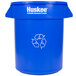 A blue plastic Continental 20 gallon round recycling bin with a white Huskee logo and recycling symbol.