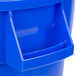A blue plastic Continental Huskee recycling bin with a handle.