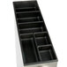 A black and silver rectangular countertop cabinet with a handle and a black plastic tray with three vertical cup slots.