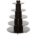 A black Enjay 5-tier cupcake stand on a table in a bakery display.