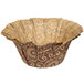 A dark brown paper baking cup with gold designs.
