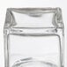 An American Metalcraft square glass cheese shaker with a clear lid.