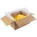 A white cardboard box filled with yellow omelettes.