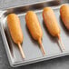 A tray of 48 State Fair Original Corn Dogs.