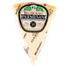 A BelGioioso Parmesan cheese wedge with a label.