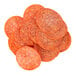 A close-up of a pile of Hormel pepperoni slices.