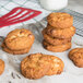 David's Cookies 1.5 oz. Preformed White Chocolate Chip Macadamia Nut Cookie Dough - 213/Case Main Thumbnail 1