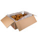 A white box filled with Big Apple Soft Pretzels.