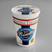 A white Montena Taranto tub of ricotta cheese with a blue and red label.