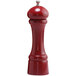 A Chef Specialties candy apple red pepper mill with a silver top on a white background.