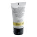 A small tube of Novo Essentials hotel and motel body lotion.