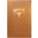 A brown Menu Solutions Bella Collection soft leather-like rectangular menu cover with a logo on a counter.