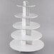 A white 5-tier cupcake stand with white round shelves.