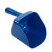 A blue plastic scoop in front of a blue Manitowoc container on a white background.