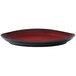 A close up of a red and black Oneida Rustic porcelain plate with a rim.