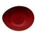A red porcelain soup bowl with a speckled surface.