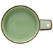 A Oneida Studio Pottery Celadon porcelain single-handled tapas dish in green.