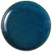 A Oneida Studio Pottery Blue Moss porcelain plate with speckled specks and a black rim.