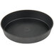 A black round Matfer Bourgeat tartlet pan with a circle in the middle.