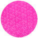 A pink round cake on a pink Enjay cake board with a pattern.