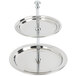 An American Metalcraft stainless steel two tiered display stand holding two round plates.