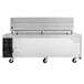 A stainless steel Cooking Performance Group chef base with wheels.