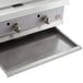 A Cooking Performance Group stainless steel gas countertop griddle with two thermostatic controls.