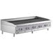 A large stainless steel Cooking Performance Group gas charbroiler with four burners.