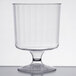 A clear plastic pedestal wine cup.