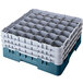 A teal plastic Cambro glass rack with 36 compartments and 5 extenders.