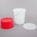 A white plastic bucket with a red base.