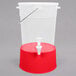 A translucent plastic beverage dispenser with a white handle and a red base.