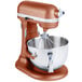 A KitchenAid copper pearl bowl lift mixer with a bowl.