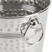 A Tablecraft stainless steel wine bucket with a metal handle.