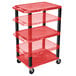 A red plastic Luxor A/V cart with three shelves and black legs on wheels.