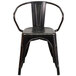 A black Flash Furniture metal chair with arms.