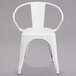 A white Flash Furniture galvanized steel chair with arms and a slatted back.