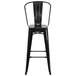 A Flash Furniture black galvanized steel bar stool with a vertical slat back.