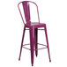 A purple Flash Furniture galvanized steel bar stool with a back.