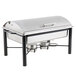 A stainless steel rectangular chafer with a roll top lid on a tray.