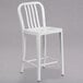 A white metal Flash Furniture counter height stool with a vertical slat back.