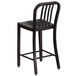 A Flash Furniture black metal counter height stool with a vertical slat back.