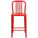 A red metal Flash Furniture counter height stool with a slat back.