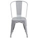 A Flash Furniture silver metal chair with a vertical slat back.