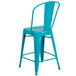A Flash Furniture teal blue metal counter height stool with a vertical slat back.