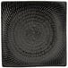 A Oneida Urban black curved square porcelain plate with a spiral pattern.