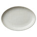 A white Oneida Knit porcelain oval plate with a textured surface.