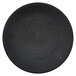 A black Oneida Urban porcelain coupe plate with a circular spiral pattern.