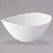 A Oneida Stage warm white porcelain bowl with a curved edge.