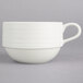 A white Oneida Manhattan porcelain cup with a handle.